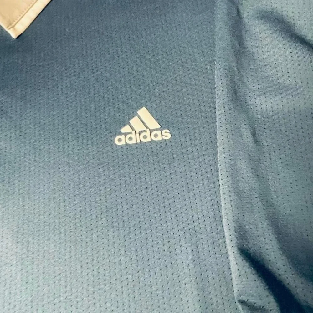 Adidas Climacool XL Men's blue polo golf shirt with solid collar and button up.